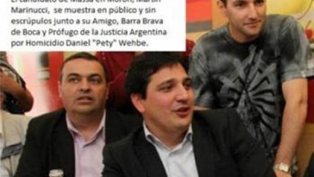 El primer candidato a concejal massista en Morón, Martín Marinucci, junto al miembro de La 12 acusado de asesinato y hoy prófugo, Daniel “Peti” Wehbe.